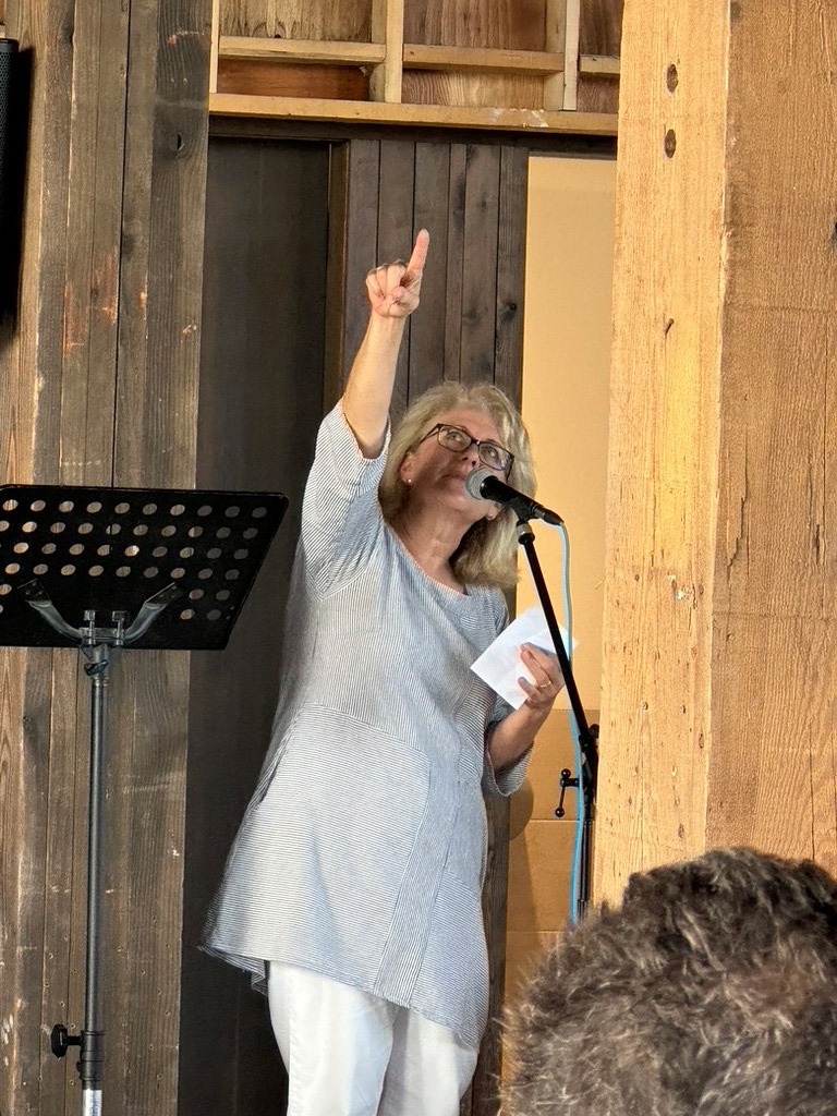 Laurel Hauser speaks to the audience at the Door County Granary's Soft Opening.