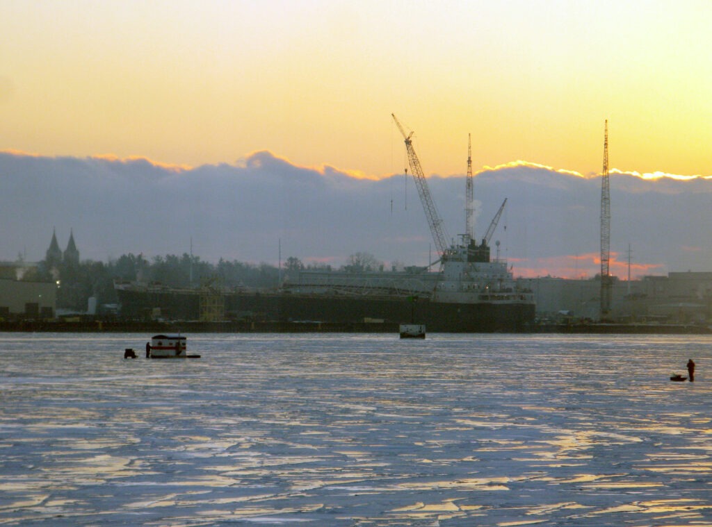 Ice fishing in front of Fincantieri Bay Ship Building